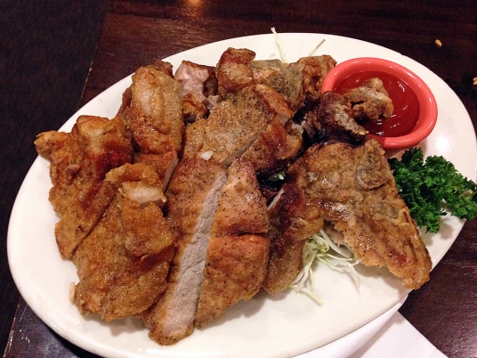 One of Side Street Inn's signature dishes is the salt-n-pepper fried pork chops